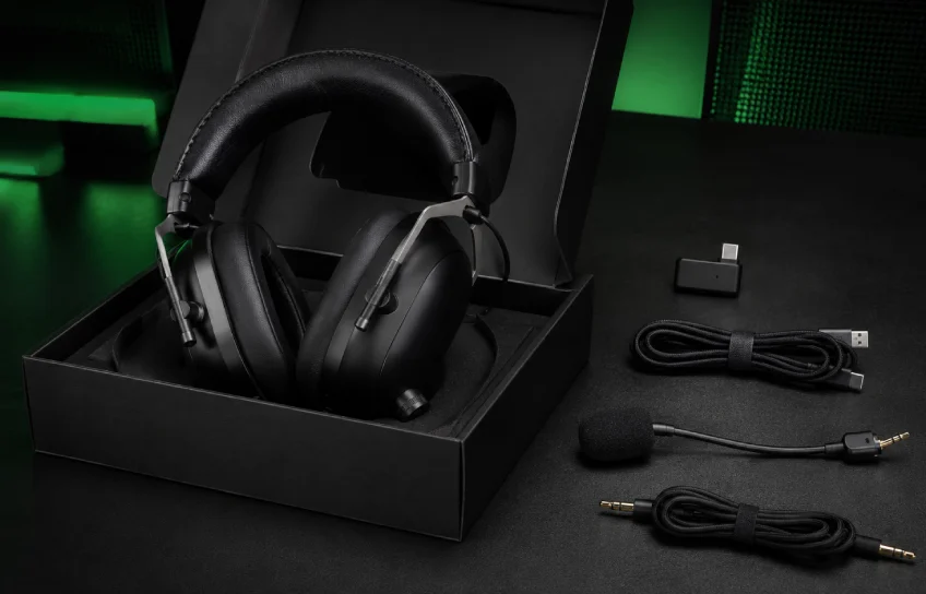 Razer BlackShark V3 Pro unboxed with headset, HyperSpeed dongle, charging cable, boom mic, and 3.5mm cable